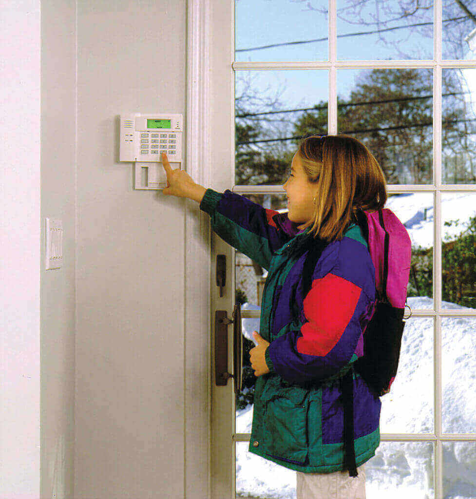 Unlimited-Security - Girl Setting Alarm